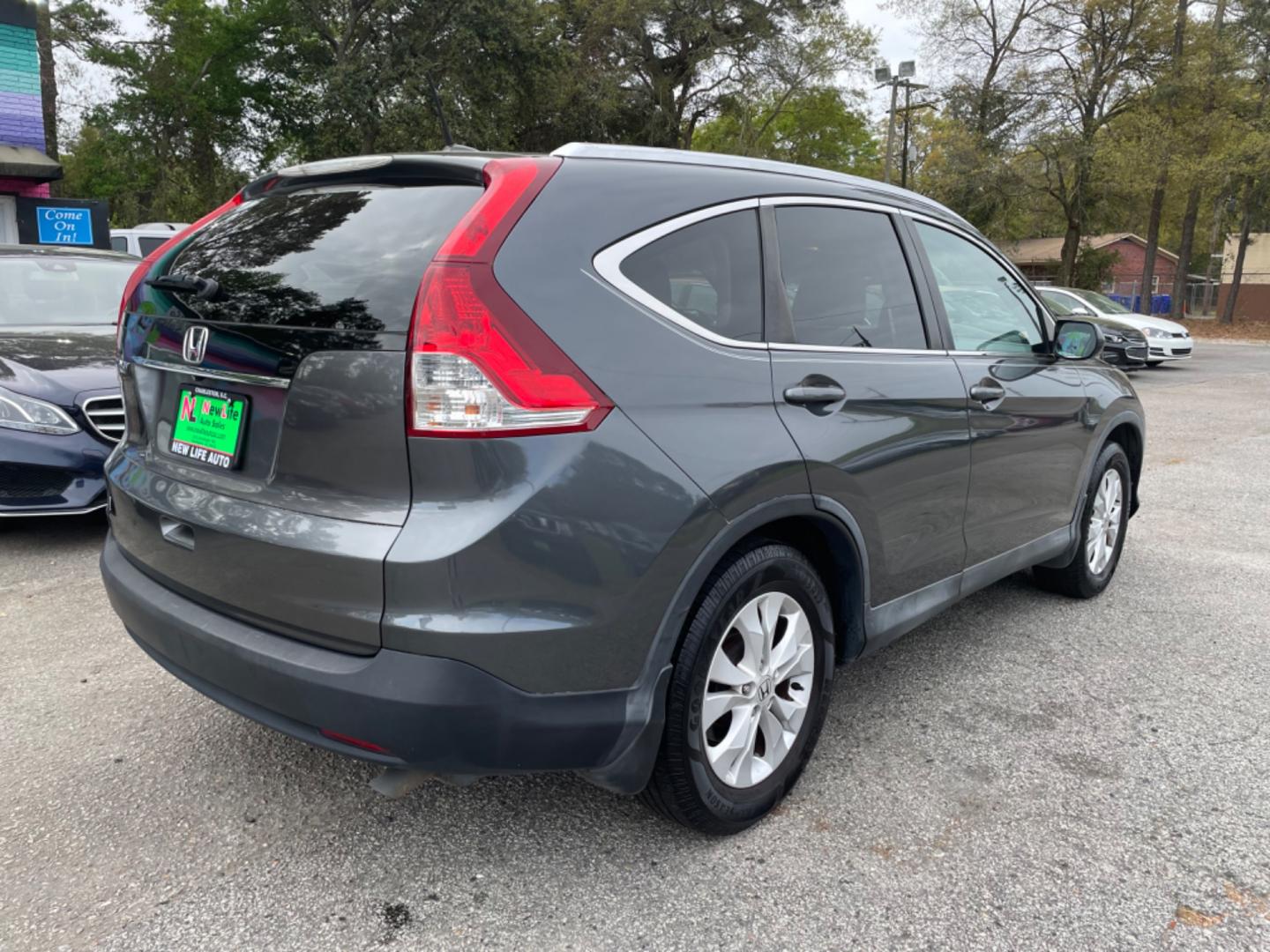 2014 GRAY HONDA CR-V EX-L (2HKRM3H73EH) with an 2.4L engine, Automatic transmission, located at 5103 Dorchester Rd., Charleston, SC, 29418-5607, (843) 767-1122, 36.245171, -115.228050 - Clean interior with Leather, Sunroof, Backup Camera, 6-Disc CD/AUX/Sat, Hands-free Phone, Dual Climate Control, Power Everything (windows, locks, seats, mirrors), Heated Seats, Keyless Entry, Alloy Wheels. Local Trade-in!! 188k miles Located at New Life Auto Sales! 2023 WINNER for Post & Courier's - Photo#7